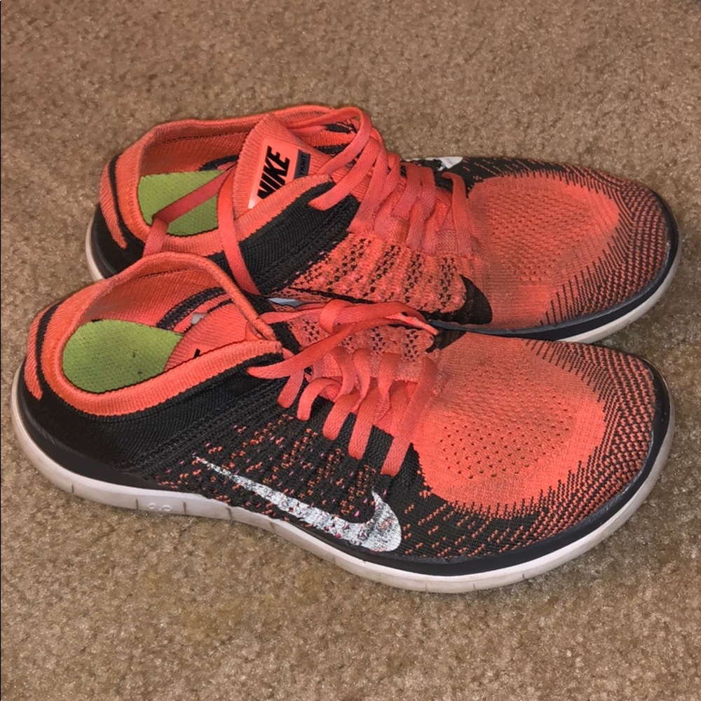 Gray and Orange Nike Flyknit